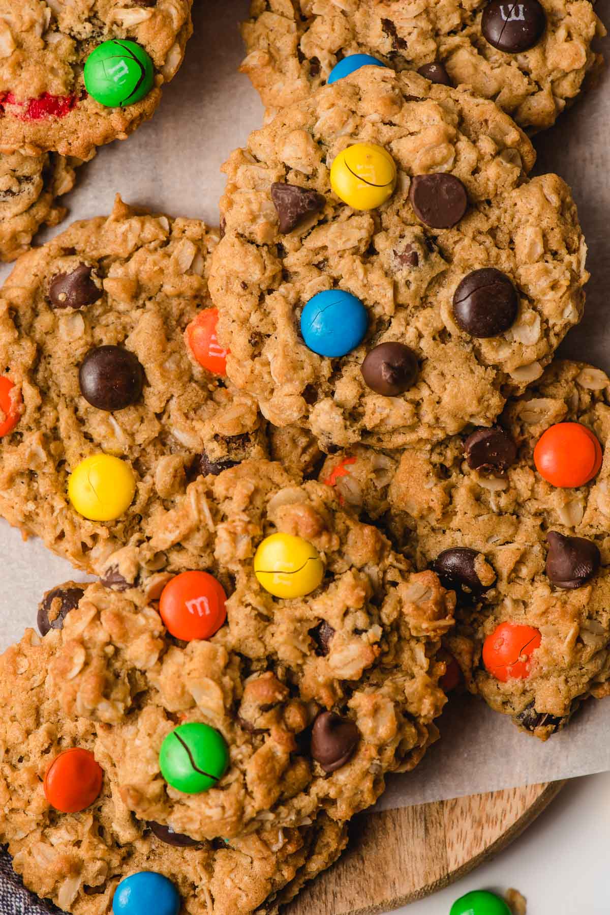 A pile of Gluten Free Monster Cookies with M&Ms.