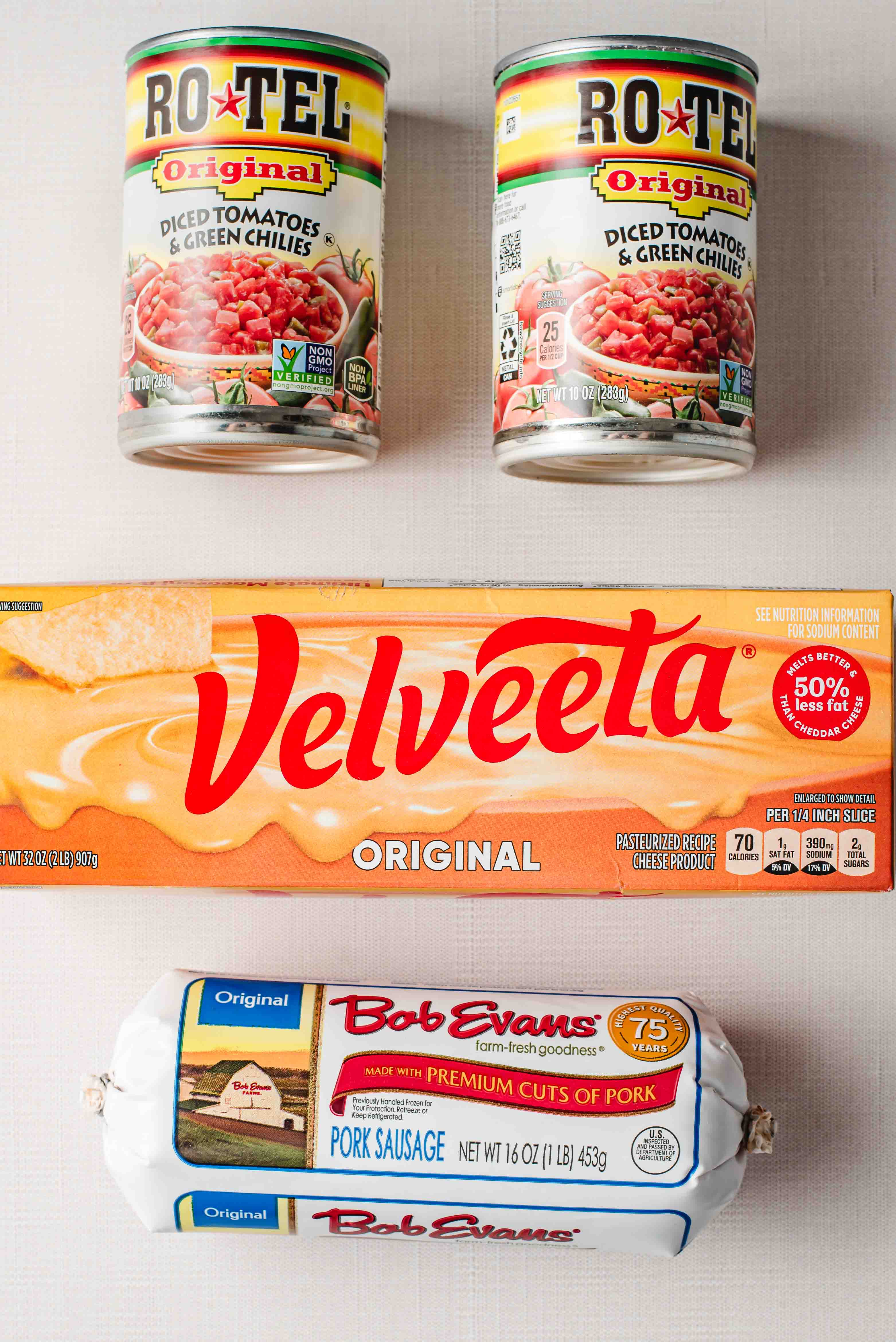 Two cans of Rotel, one box of Velveeta, one tube of sausage.