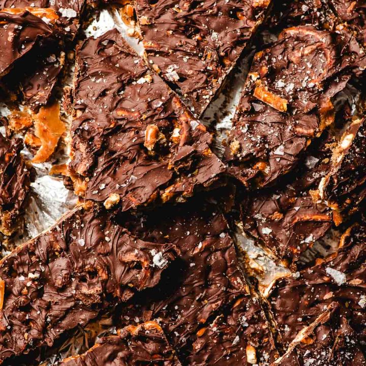 Closeup of wrenched pieces of chocolate pretzel toffee bark.