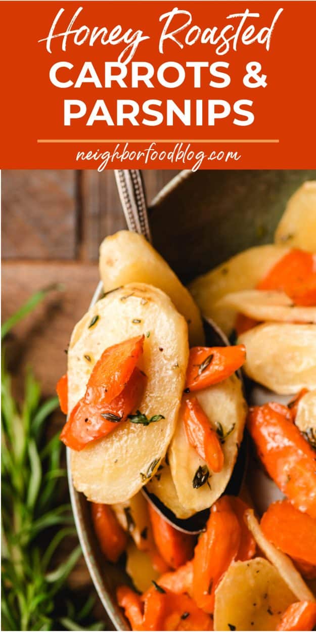 Spoon holding honey roasted parsnips and carrots with thyme and rosemary.