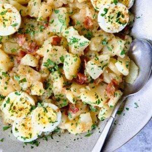 German potato salad with hard boiled egg slices.