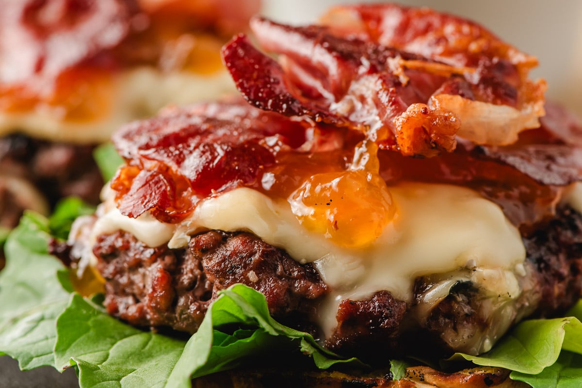 Open face burgers with brie, prosciutto, and apricot jam.