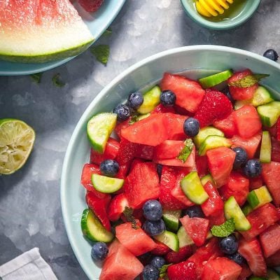 Fruit salad with watermelon, cucumber, lime, and mint