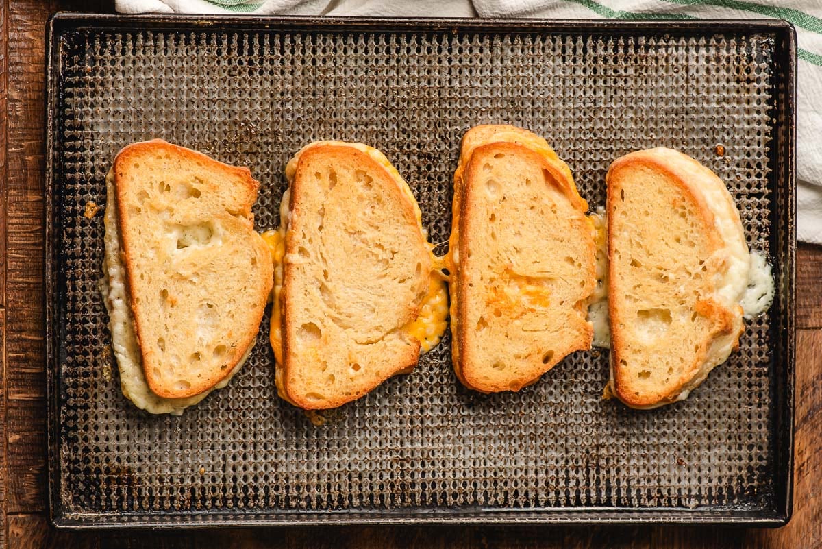 Baked grilled cheese on a sheet pan.