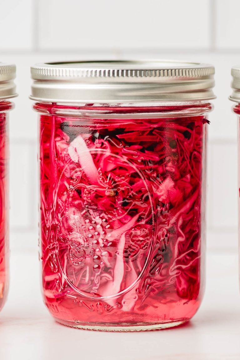 Quick pickled red onion in a mason jar.