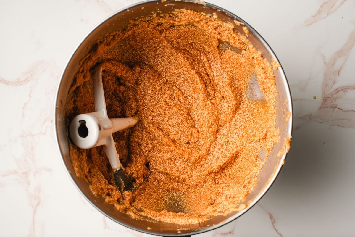 Pumpkin puree beaten into butter, sugar, and eggs.