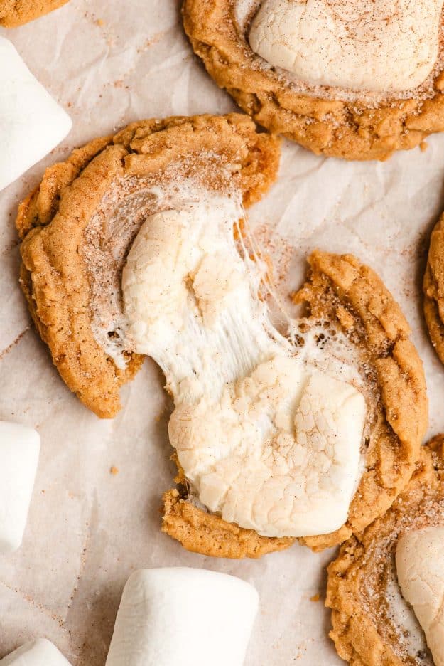 Fluffernutter cookie with a melted marshmallows being pulled apart in the center.