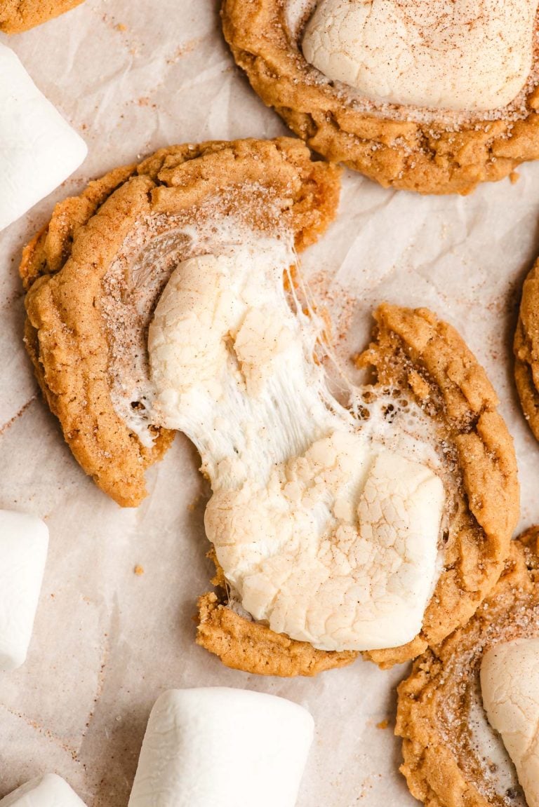 Fluffernutter cookie with a melted marshmallows being pulled apart in the center.