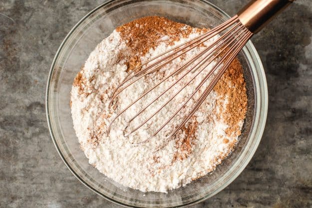 dry ingredients in a large mixing bowl with a whisk resting inside