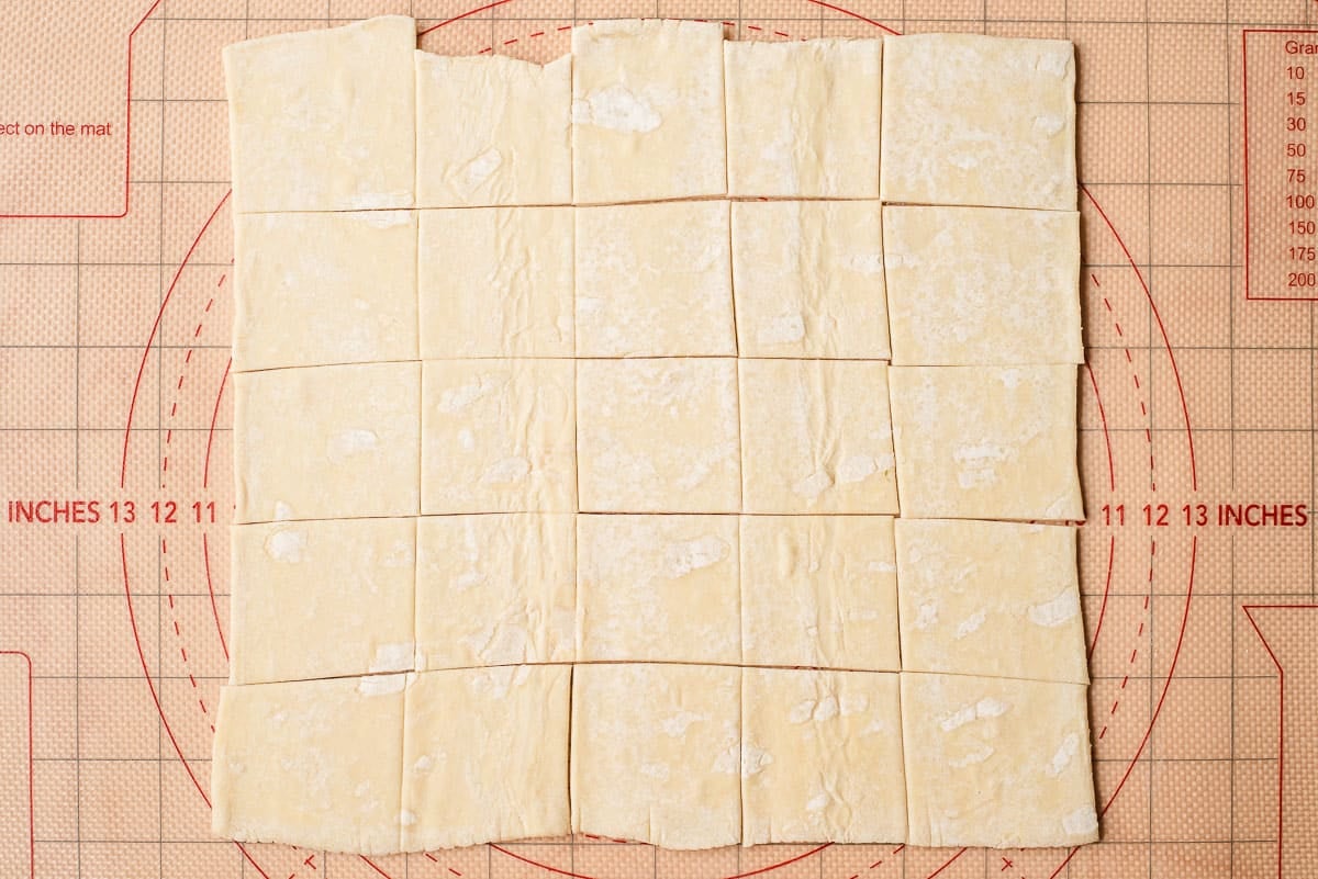 Puff pastry sheet cut into 25 squares.