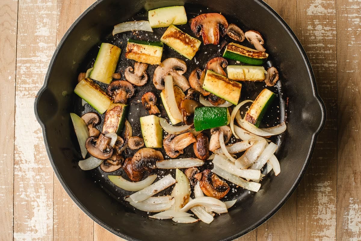 browned hibachi veggies in a cast iron pan