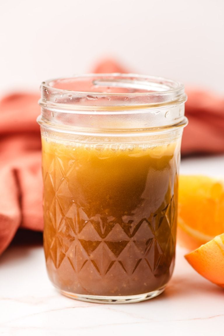 Orange dressing in a glass mason jar