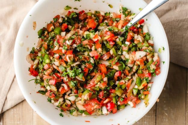 a bowl filled with chopped veggies