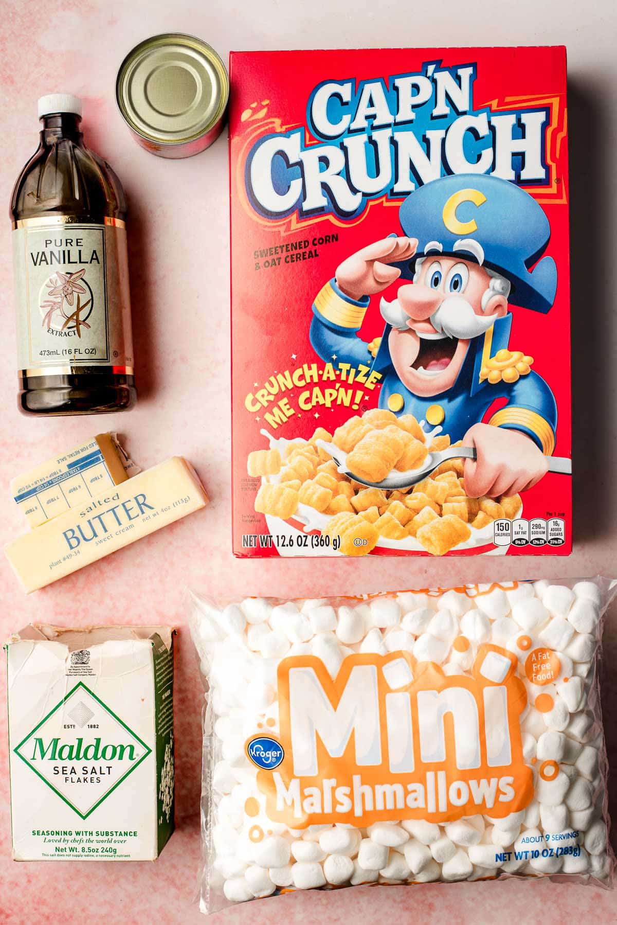 Cap'n crunch cereal box, vanilla, butter, salt, sweetened condensed milk, and mini marshmallows.