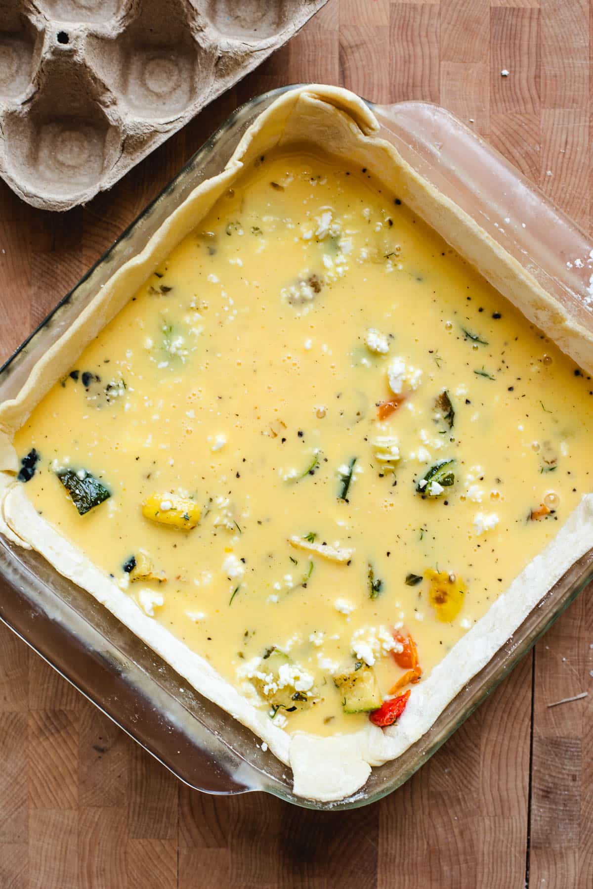 Roasted vegetables and egg mixture in a puff pastry crust.