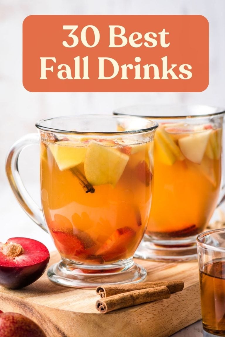 Apple Cider Sangria in two glass mugs with text: "30 Best Fall Drinks"