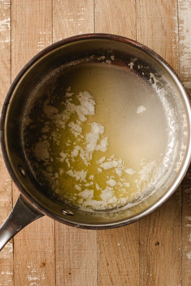 Butter melted in a sauce pan.