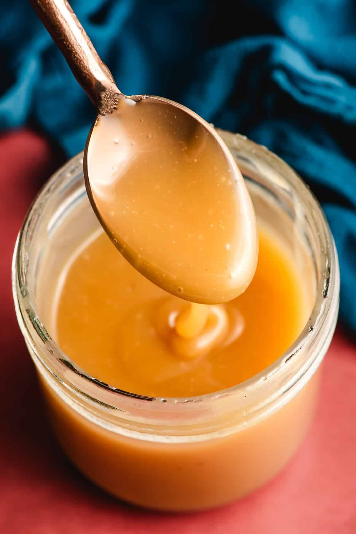 Spoonful of maple caramel sauce.