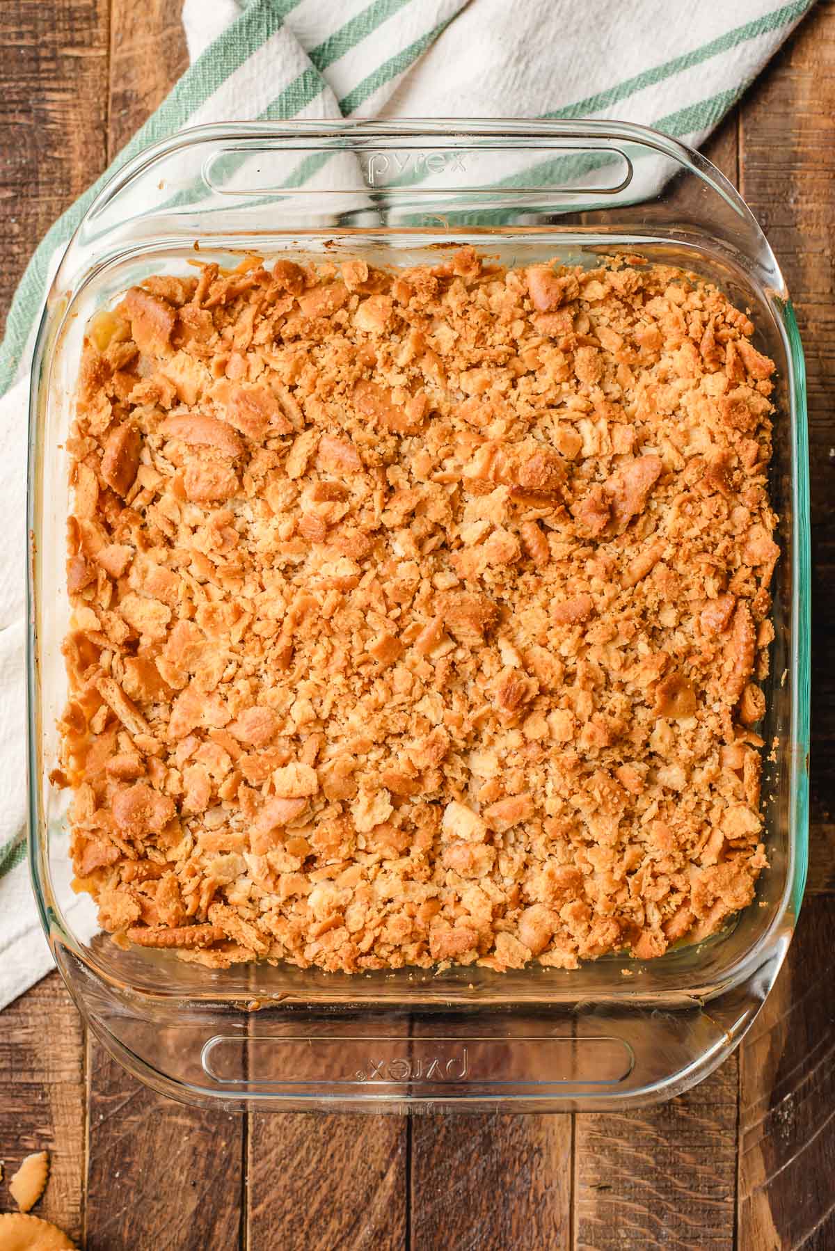 Freshly baked Ritz cracker chicken casserole in a glass dish.