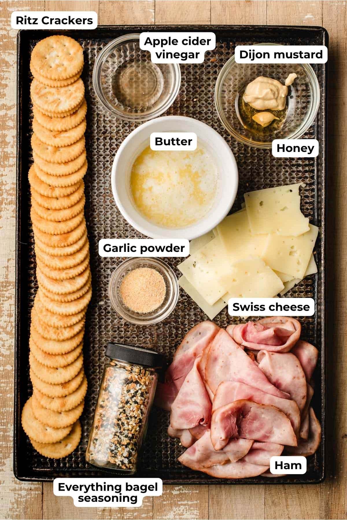 Ritz crackers, apple cider vinegar, dijon mustard, melted butter, cheese, ham, garlic powder, everything bagel seasoning.