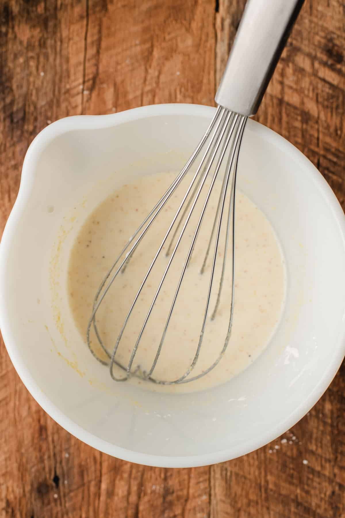 mixing the cornmeal into the egg mixture