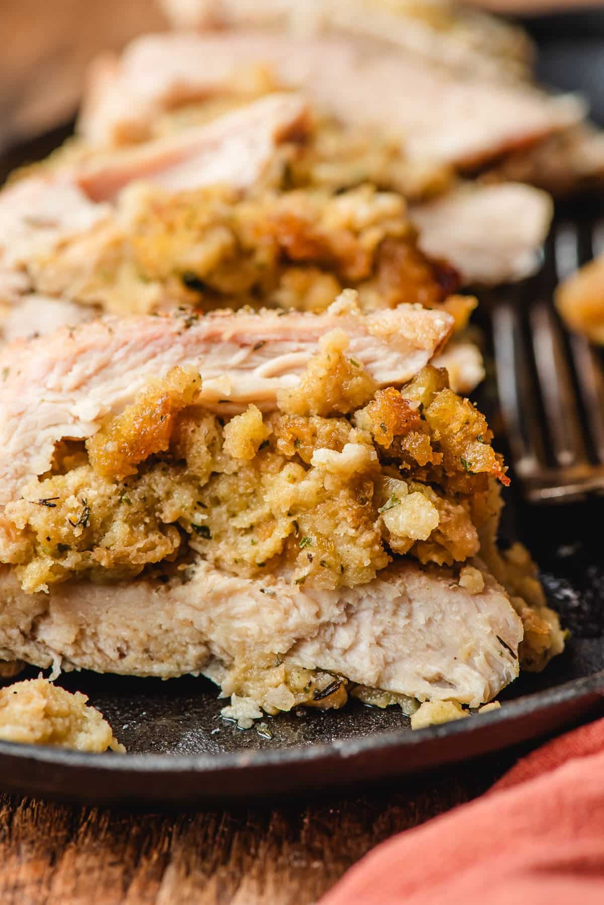 stuffing stuffed chicken cut in half to show the cooked middle 
