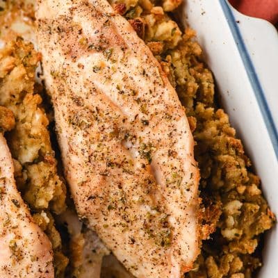 baked stuffing stuffed chicken in a casserole dish