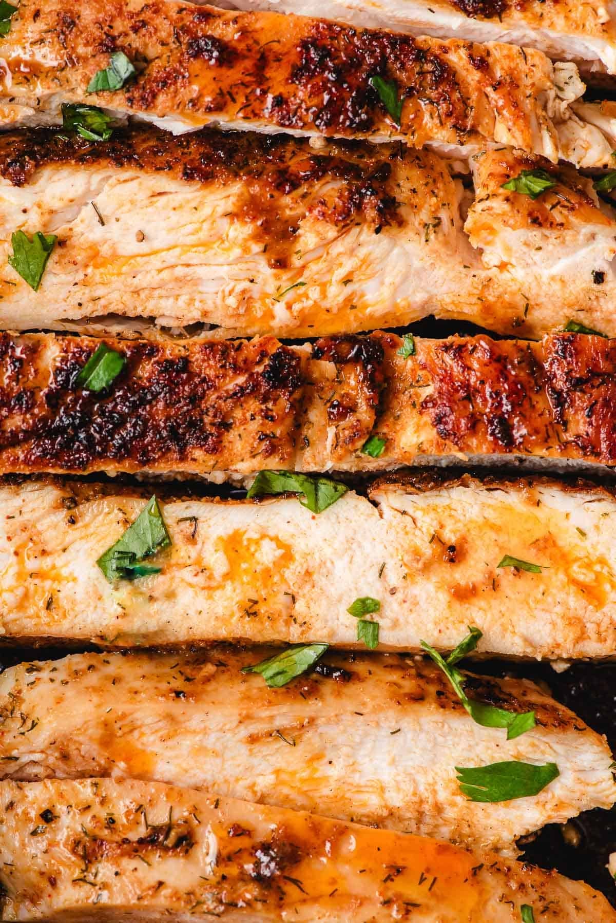 Perfectly seared chicken breast slices.