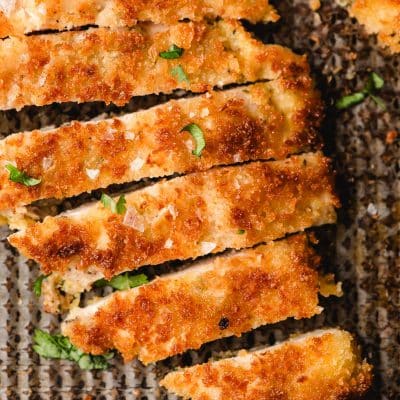 sliced chicken cutlets on a cooling rack