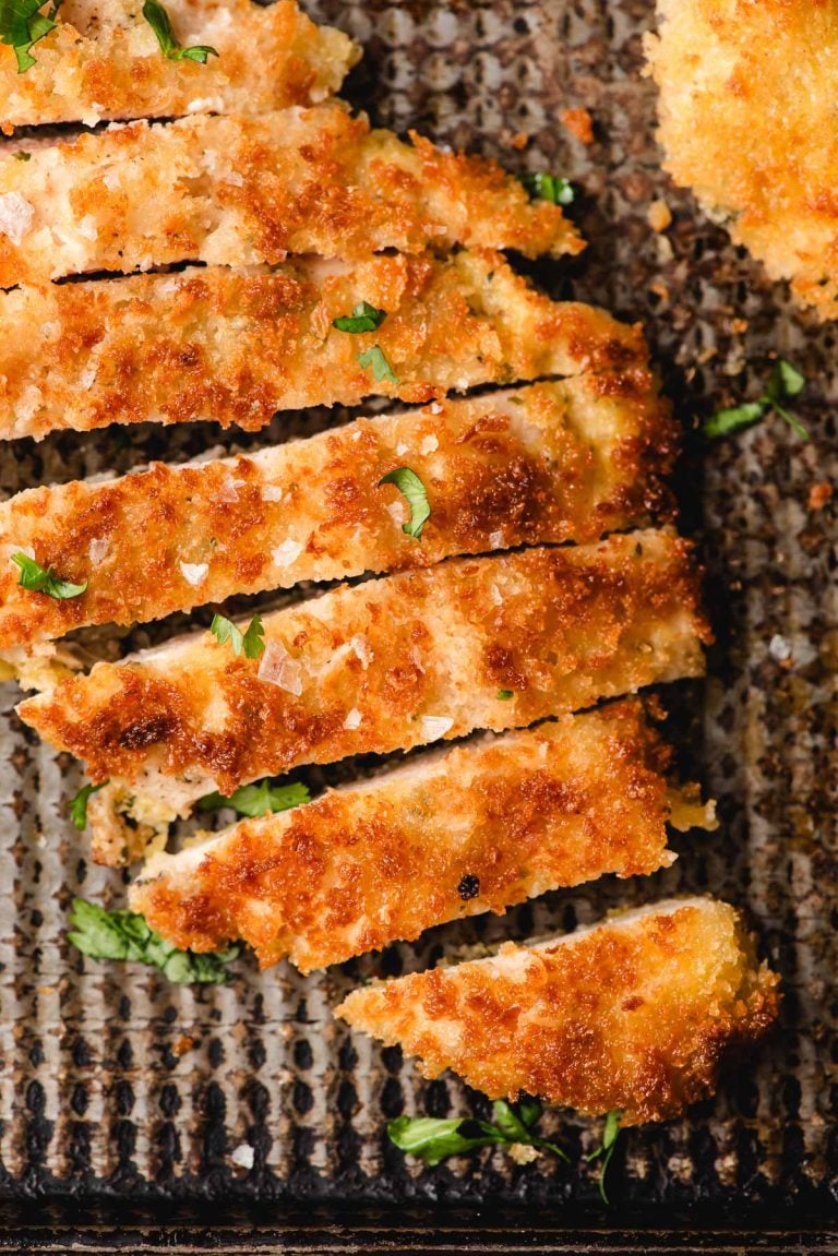 sliced chicken cutlets on a cooling rack