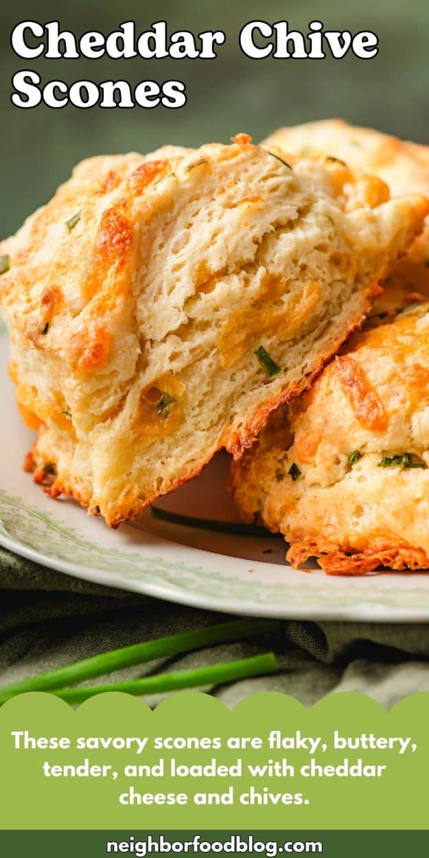 Flaky cheddar chive scone on a pretty plate.